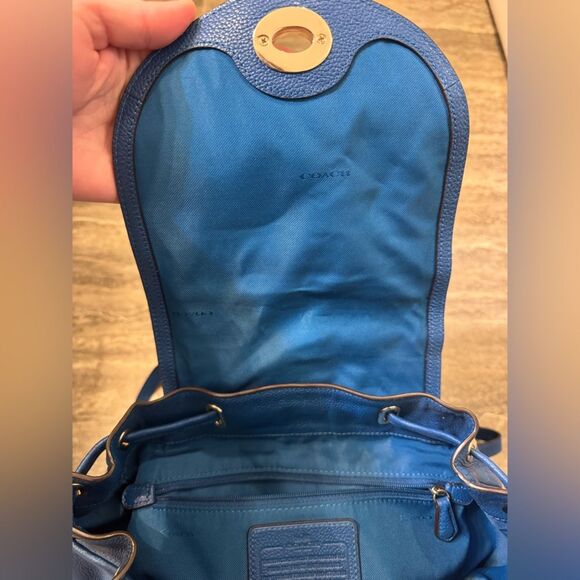 coach blue turnlock backpack Coach Blue Pebbled Leather Turn lock Tie Rucksack Backpack